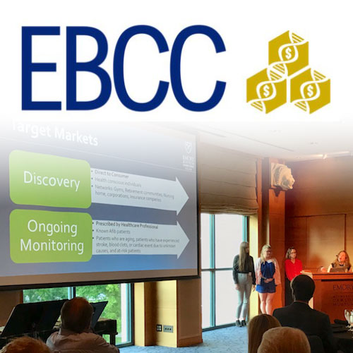 EBCC logo overlaid on a presentation being given to a group